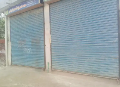 Shop for sale near main college road 